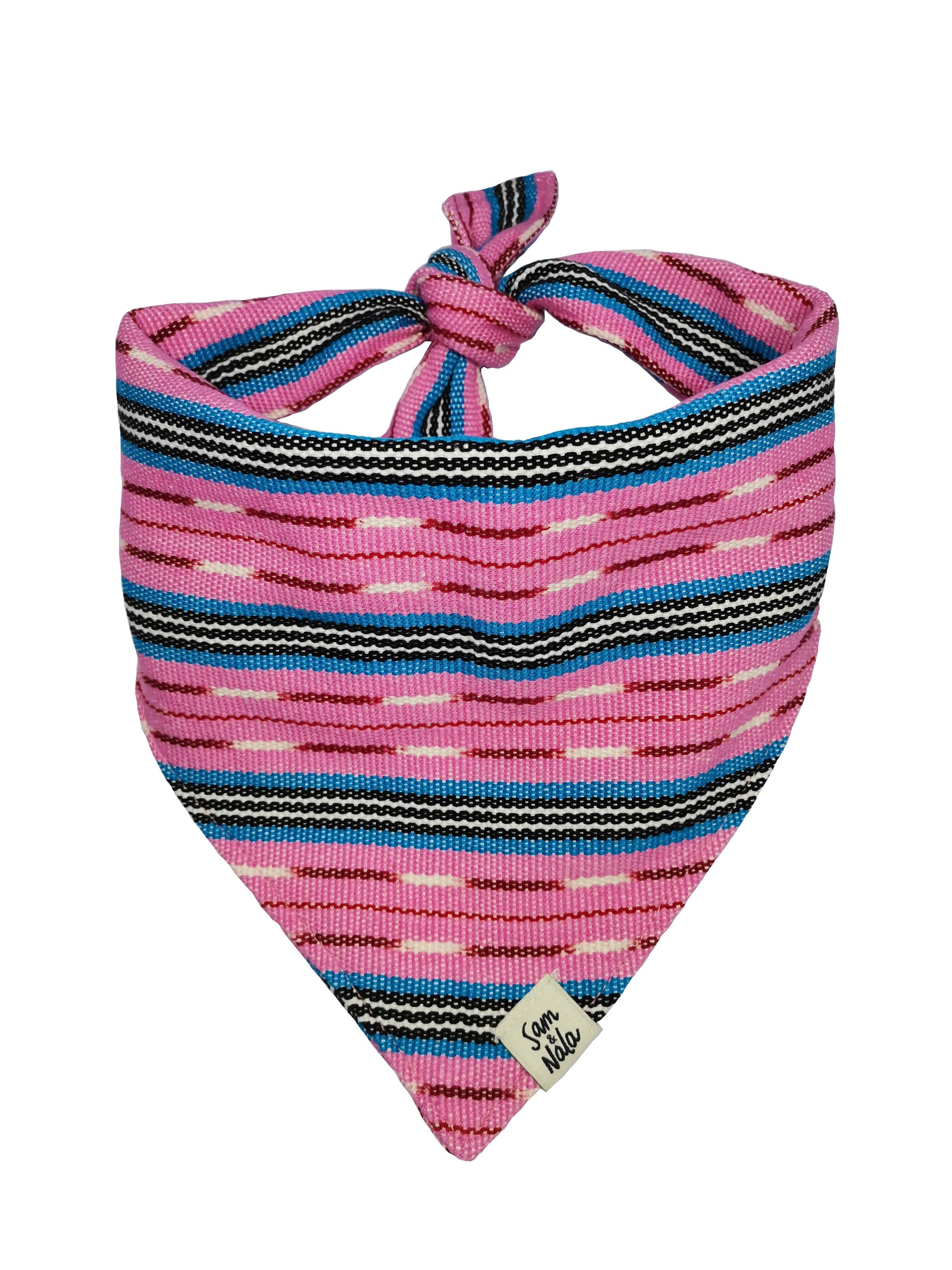 This mix of energetic pink and vibrant blue envelopes you in laughter, and sunny spring days. Machine Washable Dog Bandana
This fabric was woven in Totonicapán, which is located in the Western Highlands of Guatemala and has a population composed largely