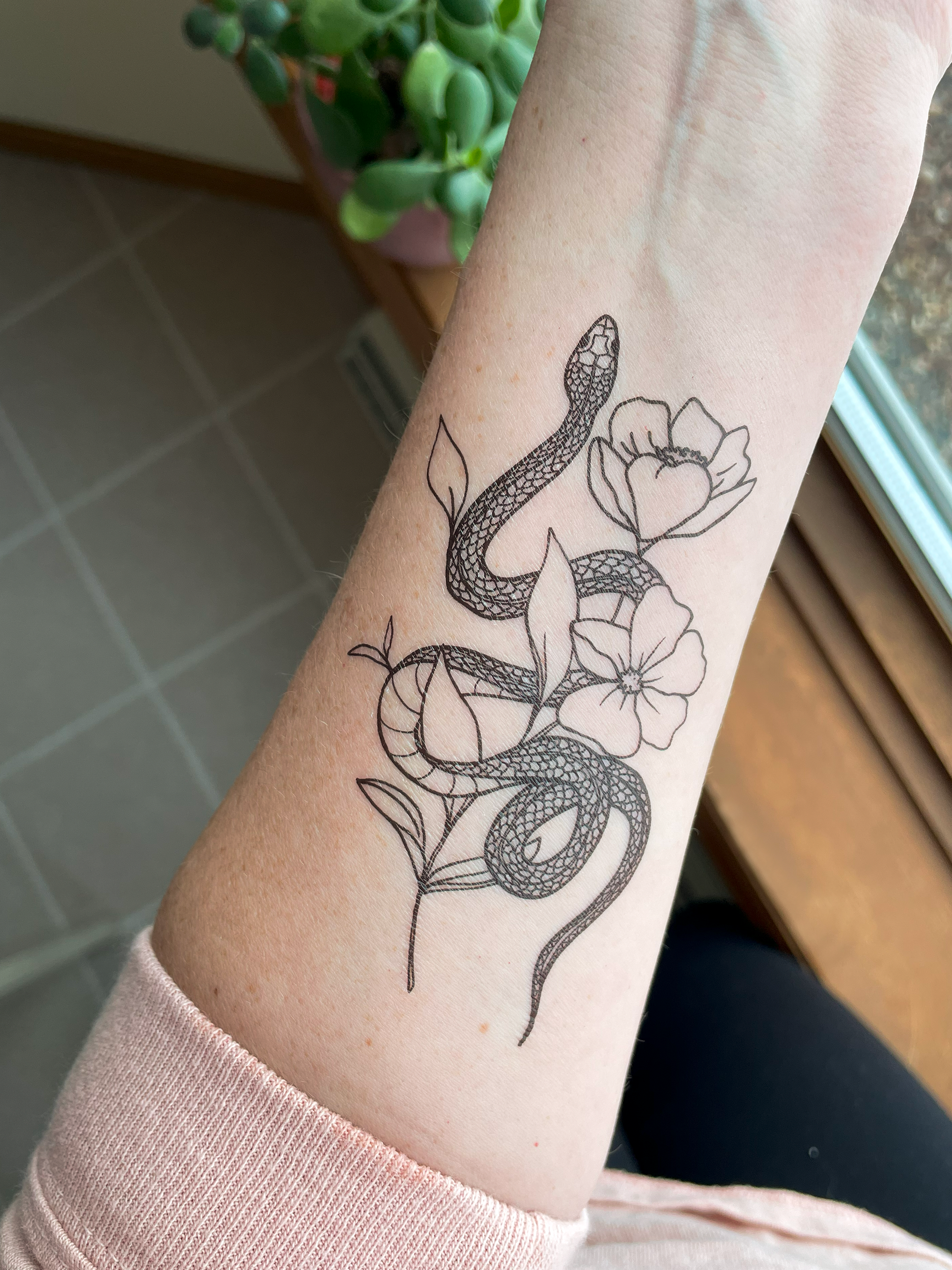 Featuring a hand-drawn garden (garter) snake slithering through poppy flowers. This temporary tattoo makes a thoughtful small gift or a pain-free way to try out a tattoo!
DETAILS:
Set of two temporary tattoos
Dimensions: 2.5" x 4.5"
Safe, non-toxic, and