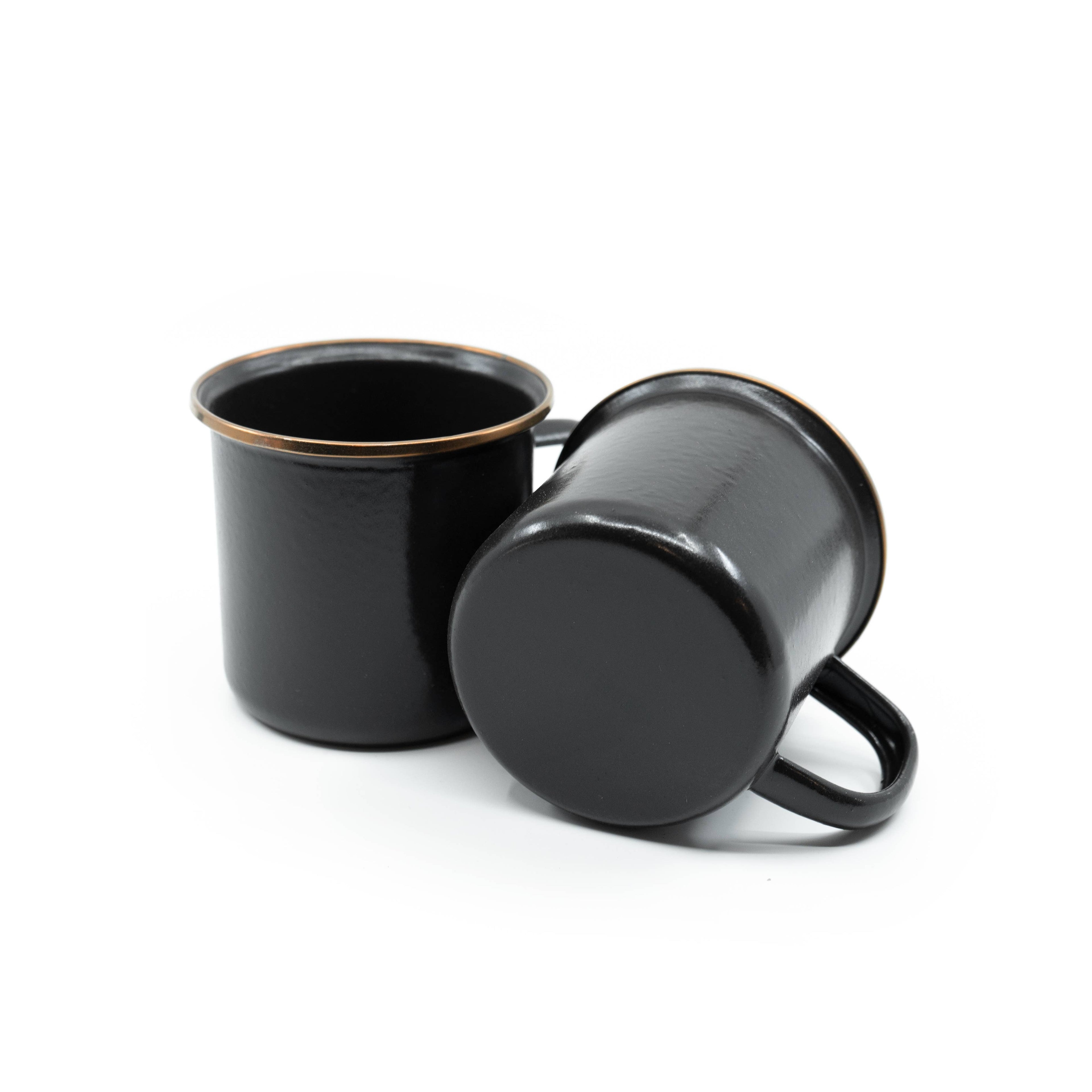 Complete your place settings with this set. Highlighted by a copper rim, a cup of coffee never looked so inviting. Each item features a hand-finished baked stainless steel trim, creating unique pieces that form a cohesive set.
Our Enamelware rim is heat