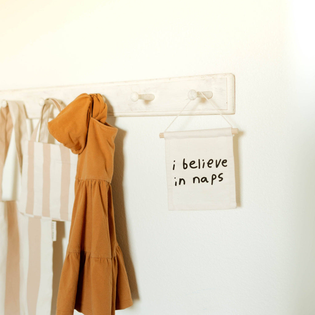 Imani Collective- I believe in naps hang sign