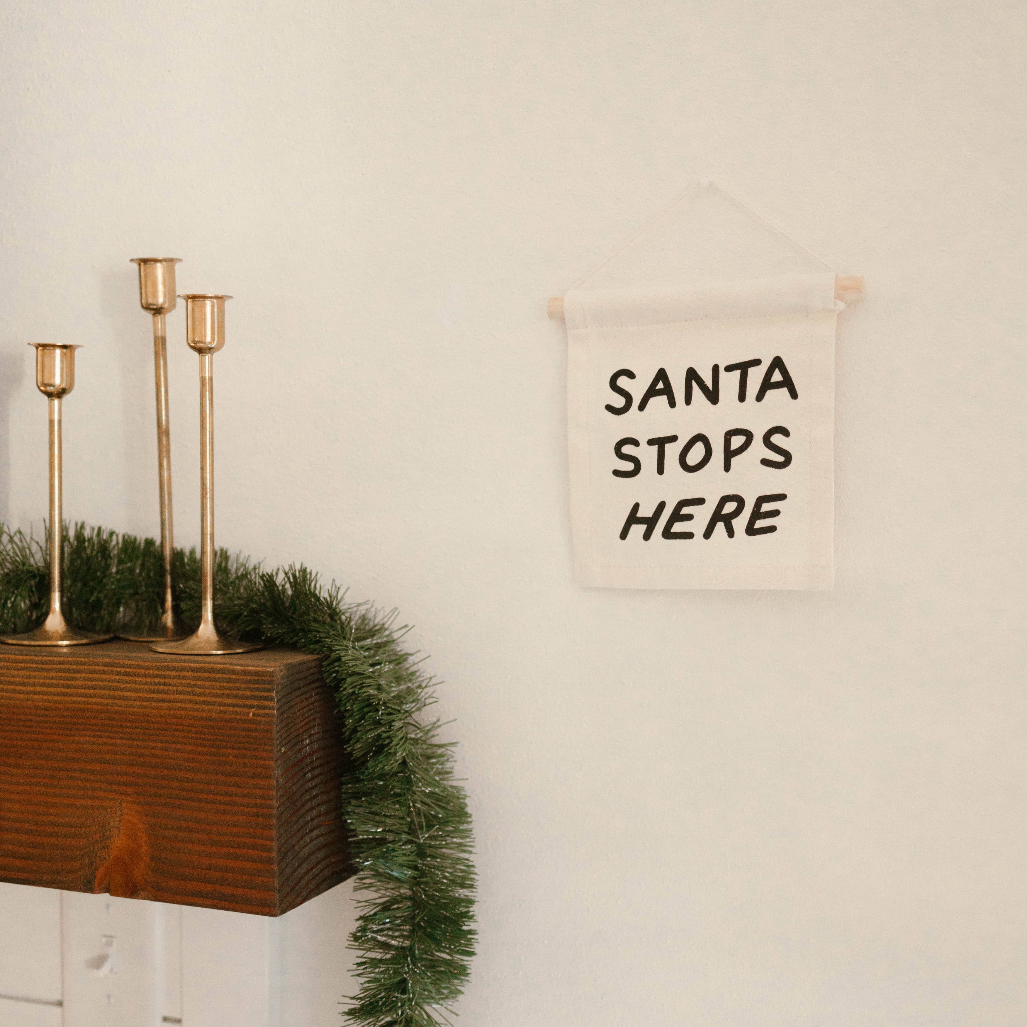 Imani Collective- Santa stops here hang sign