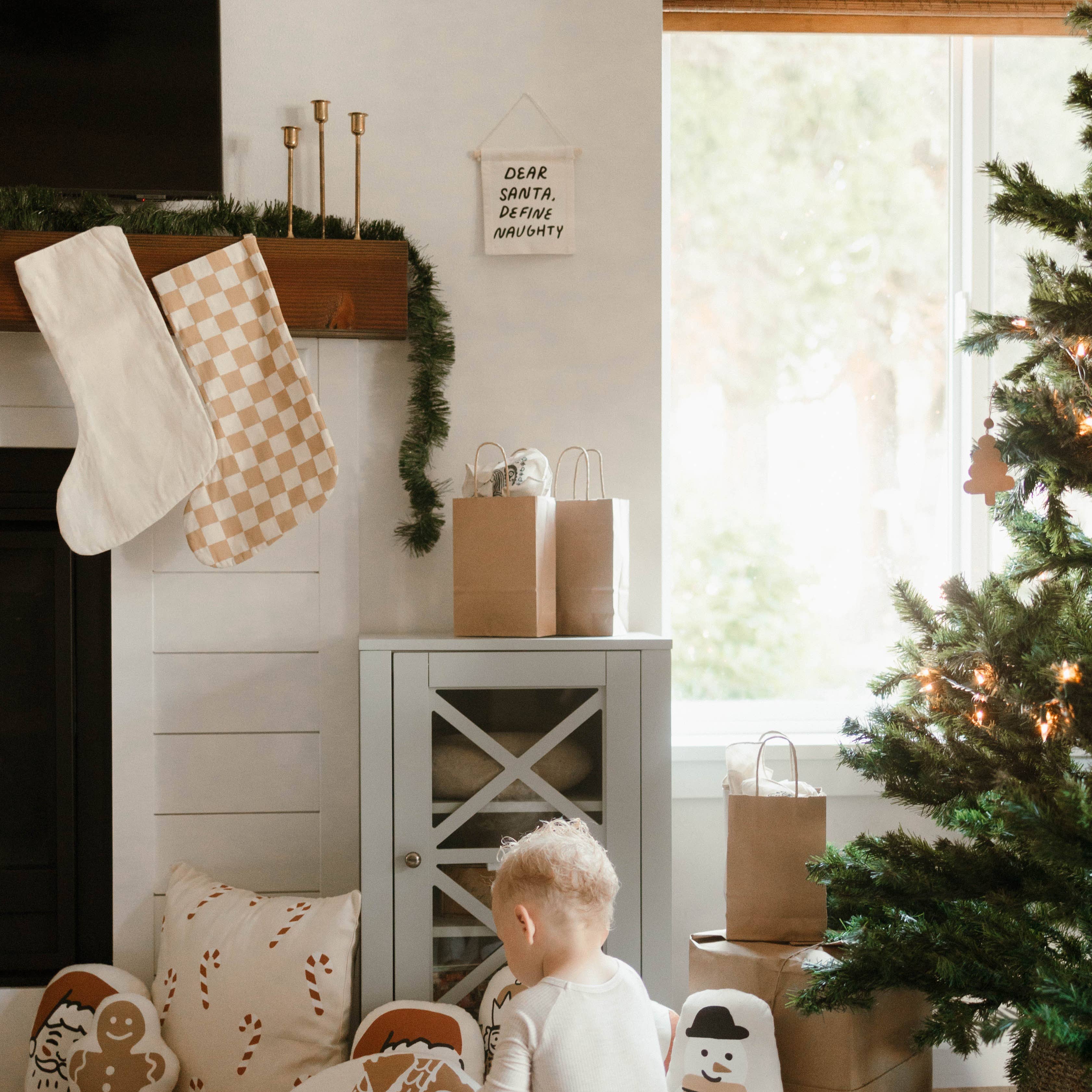 Imani Collective- Dear santa, define naughty hang sign