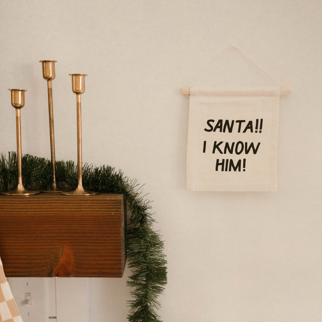 Imani Collective- Santa I know him hang sign