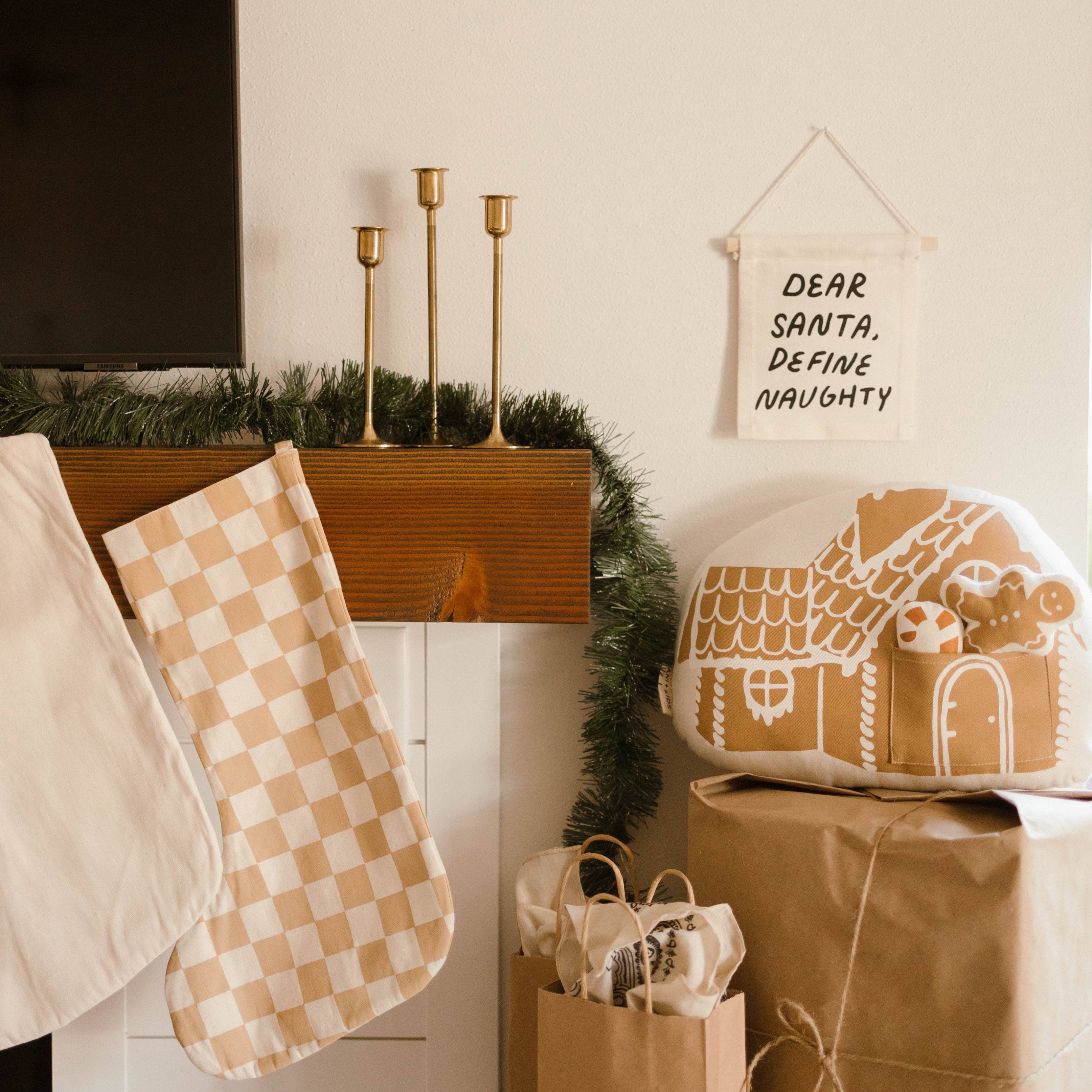 Imani Collective- Dear santa, define naughty hang sign