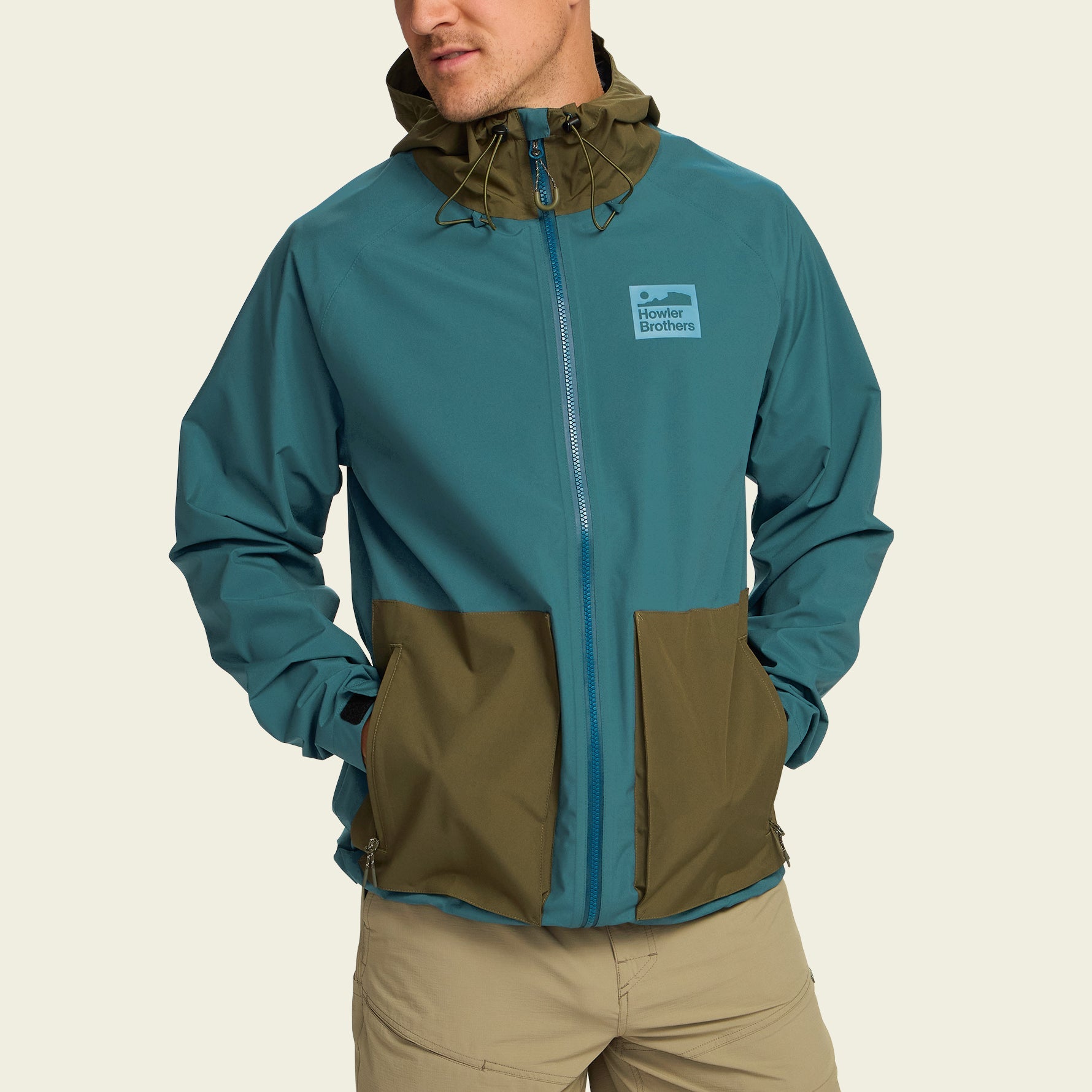 Howler Bros- Storm Splitter Rain Shell: Dark Teal/ Dark Olive