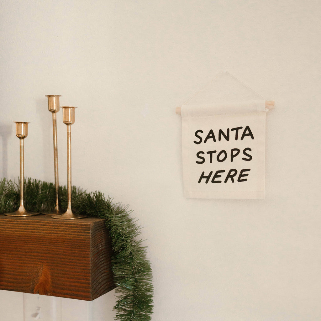 Imani Collective- Dear santa, define naughty hang sign