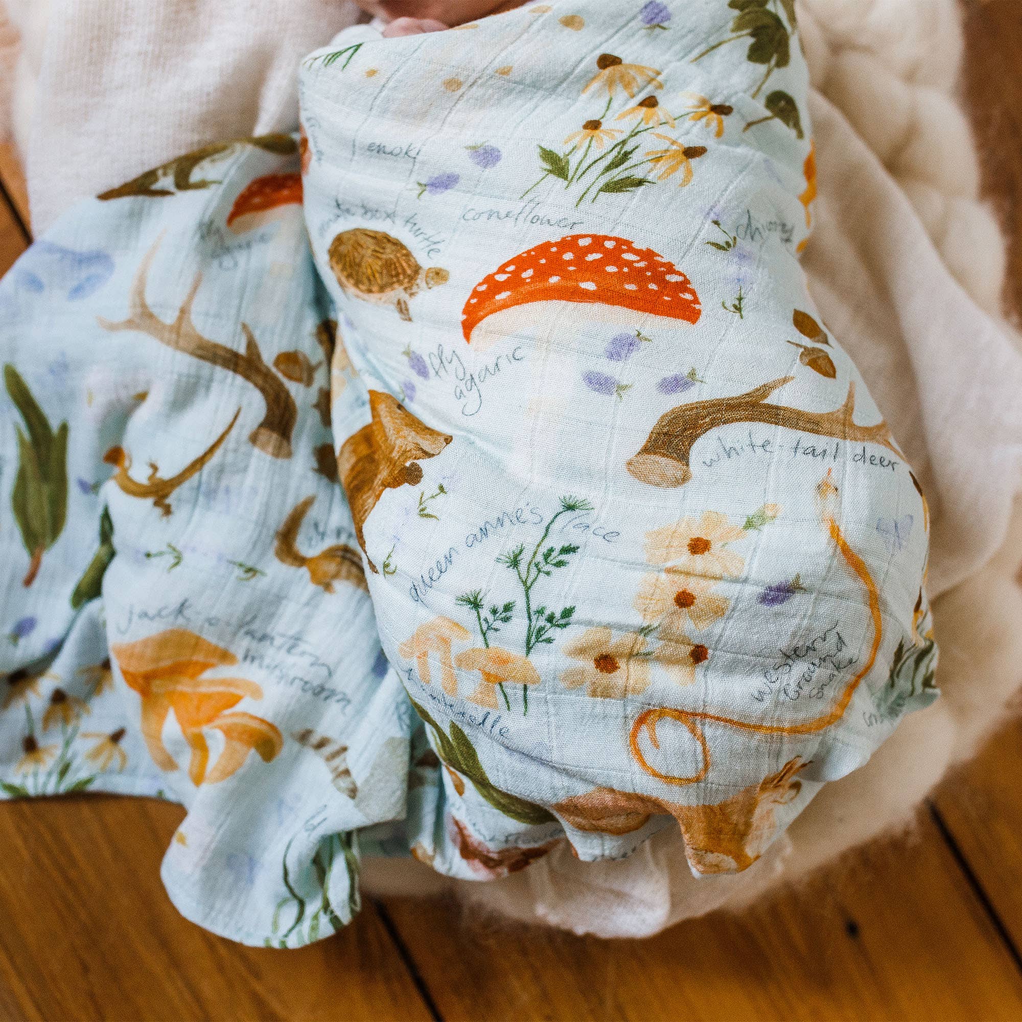 1Canoe2- Flora & Fauna Baby Swaddle
