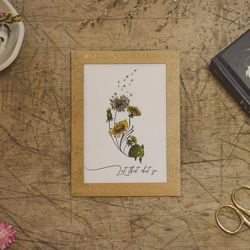 Orchid & Pine- Tiny Intentions Let That Sh*T Go Dandelion Tattoo