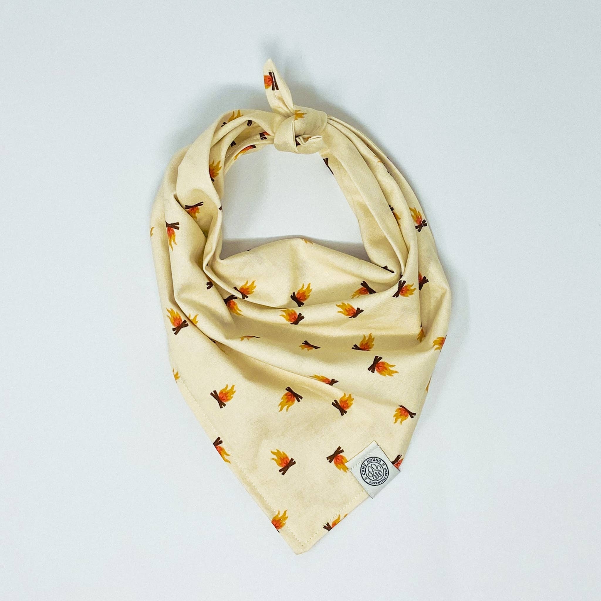 Headed out on a camping trip? This bandana is perfect for sitting around the campfire, enjoying s'mores, and telling stories! -Shelby

All of our bandanas are tie-on.
We recommend 1-2-2-1 sizing. Only looking to carry one size? We recommend size L.
Made o