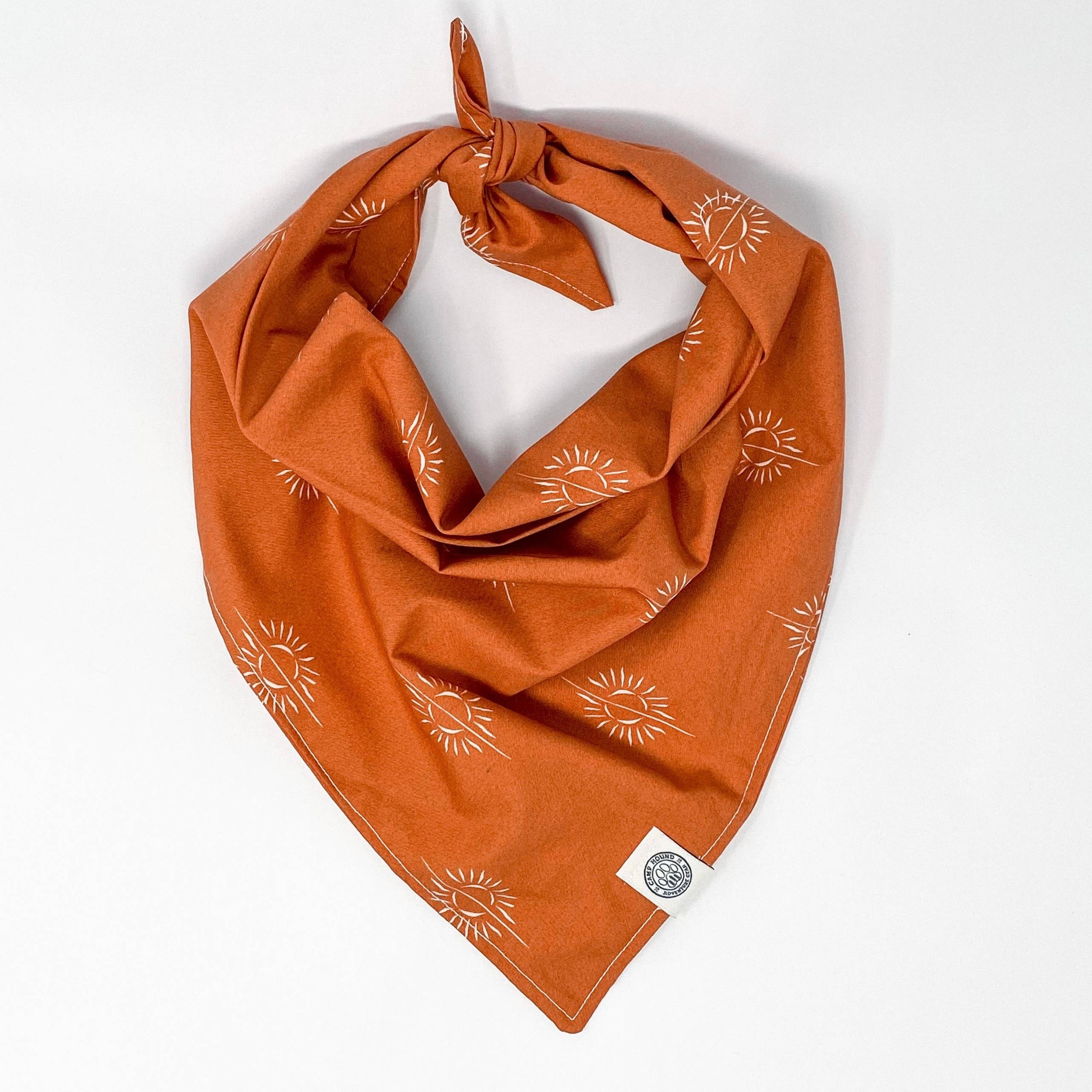 This bandana has been one of our best sellers since we first added it back in 2020! It's a little ray of sunshine that makes me so happy :-)  -Shelby

All of our bandanas are tie-on.
We recommend 1-2-2-1 sizing. Only looking to carry one size? We recommen