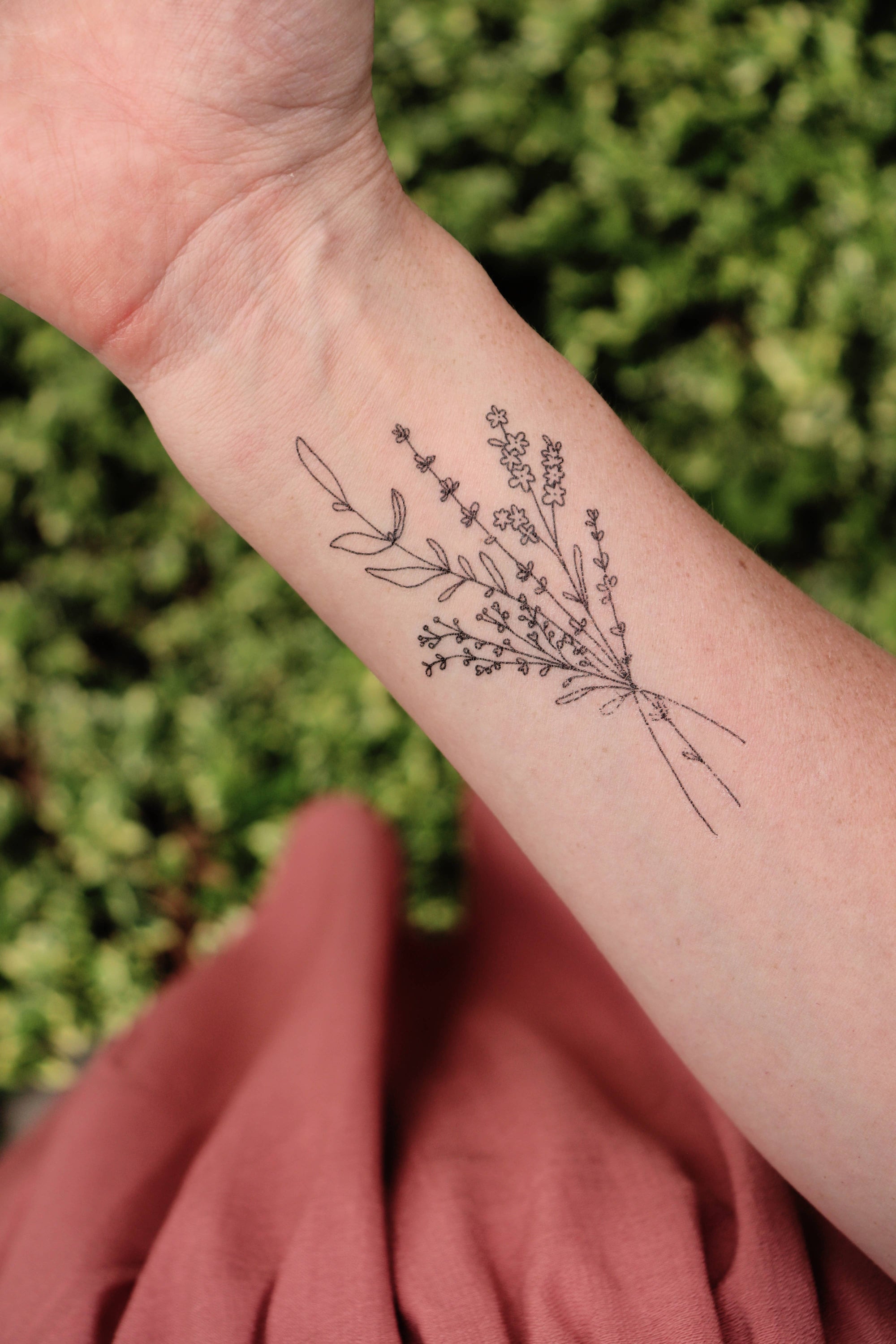 Featuring thoughtfully hand drawn wildflowers, this best-selling temporary tattoo reminds us to bloom wherever life may plant us.  This temporary tattoo makes a thoughtful small gift or a pain-free way to try out a tattoo!

DETAILS:
Set of two temporary t