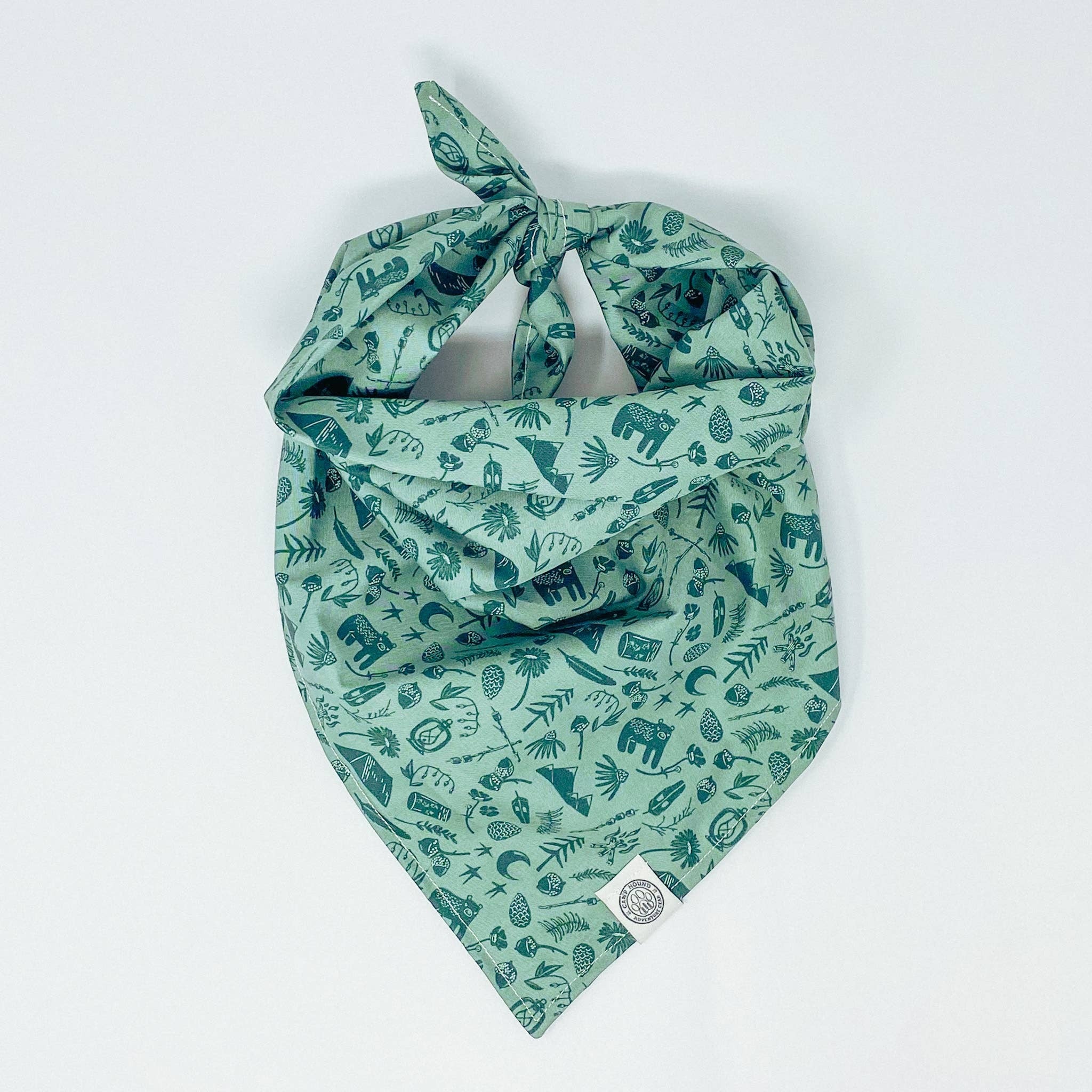 Let your pup join in on the fun with this Let's Go Camping Bandana! Featuring a minimalist camping print in sage green, it's a paw-sitively perfect way to take Fido along wherever your adventure takes you!

Matching scrunchie available

All of our bandana