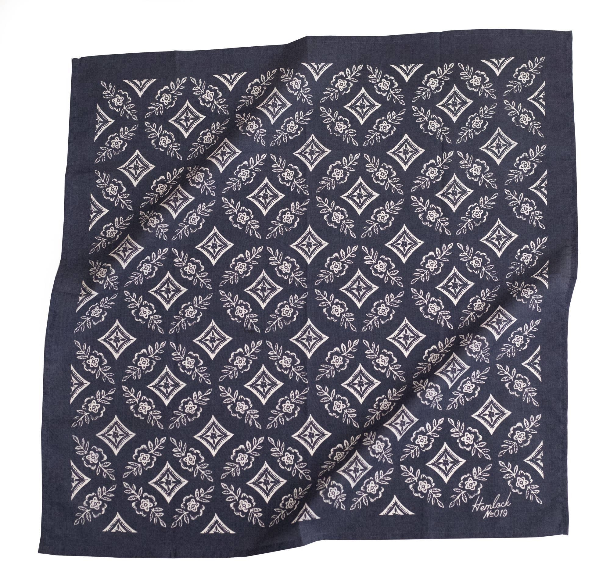 Color: Navy Blue with a white floral pattern

Material: 100% premium cotton

Sizing: 22x22 inches

Designed in the U.S.

Hand screen-printed in India

Bandanas can be used in so many different ways! Use it as a handkerchief on hikes, wear it in your hair 