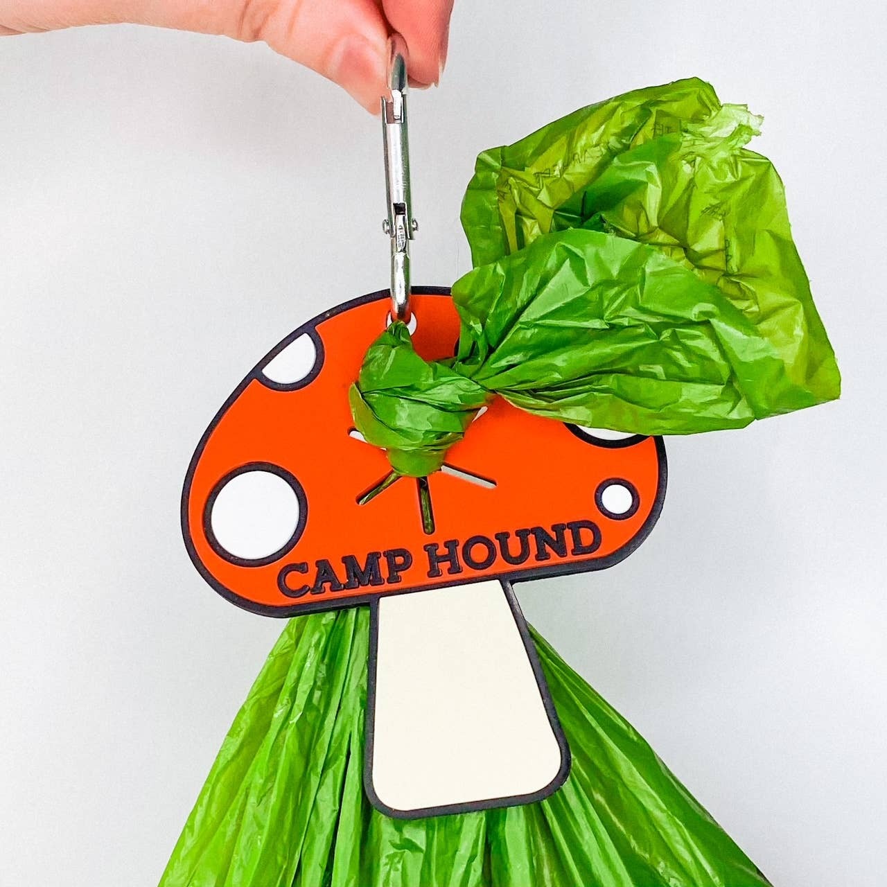 Leave no trace has never been easier! These poop carriers pop right on your leash for hands-free poop carrying. No more awkward waves with a full poop bag in your hand! They're also super cute in my opinion :-) -Shelby

Measures approx. 3in x 3 in
Made of