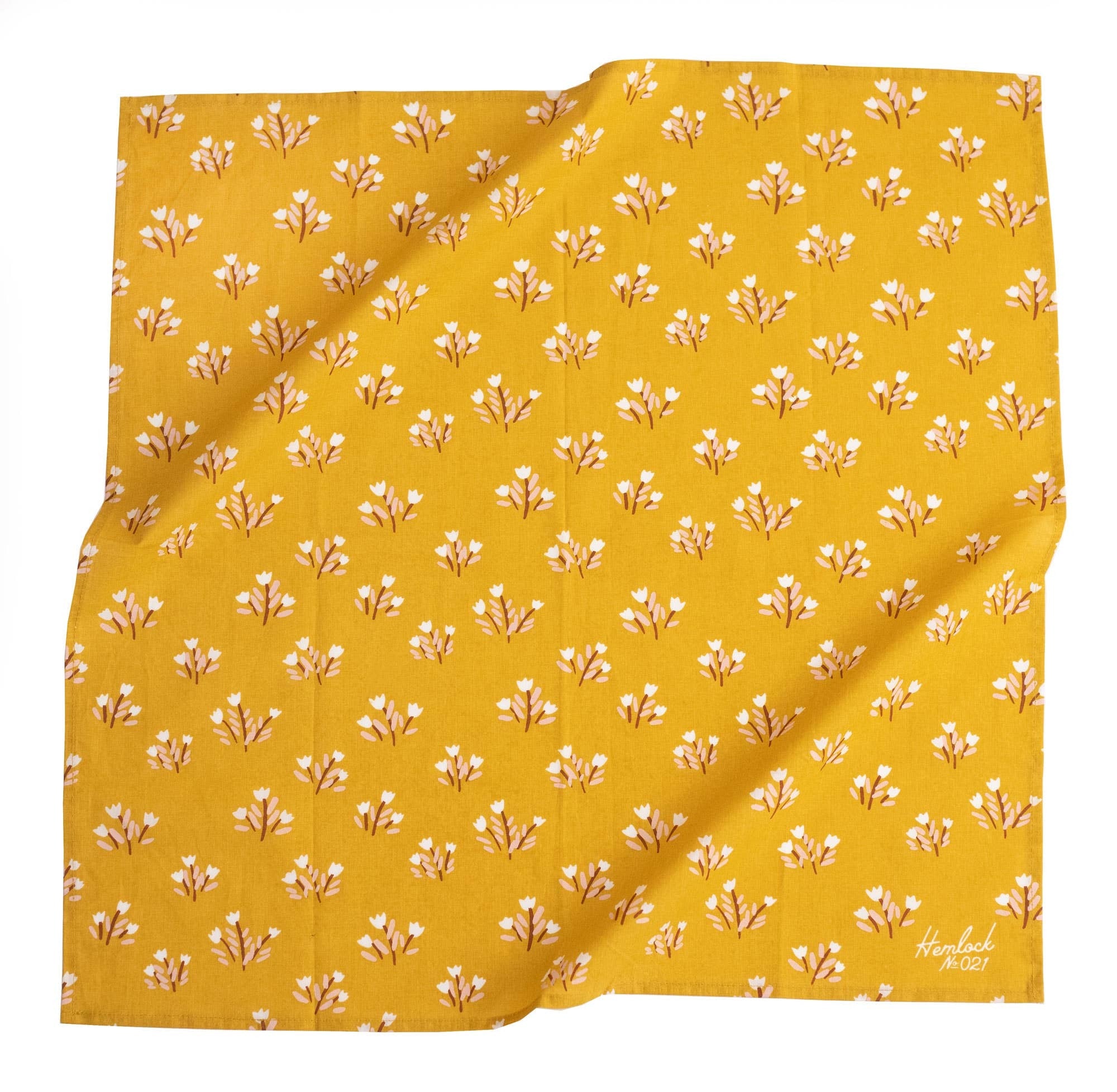Color: Yellow with Pink flowers

Material: 100% premium cotton

Sizing: 22x22 inches

Designed in the U.S.

Hand screen-printed in India

Bandanas can be used in so many different ways! Use it as a handkerchief on hikes, wear it in your hair or on your cl