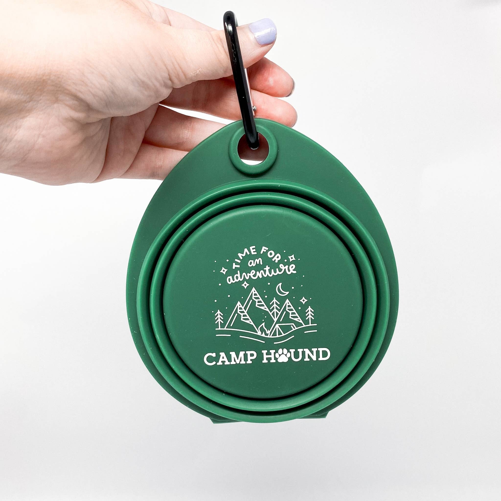 Take your pup's next adventure to the next level with our Dual Travel Dog Bowl! This 2-in-1 collapsible bowl is perfect for camping or any outdoor adventure. Easily attach it to your bag with its carabiner clip, and get ready to explore. And with its dark
