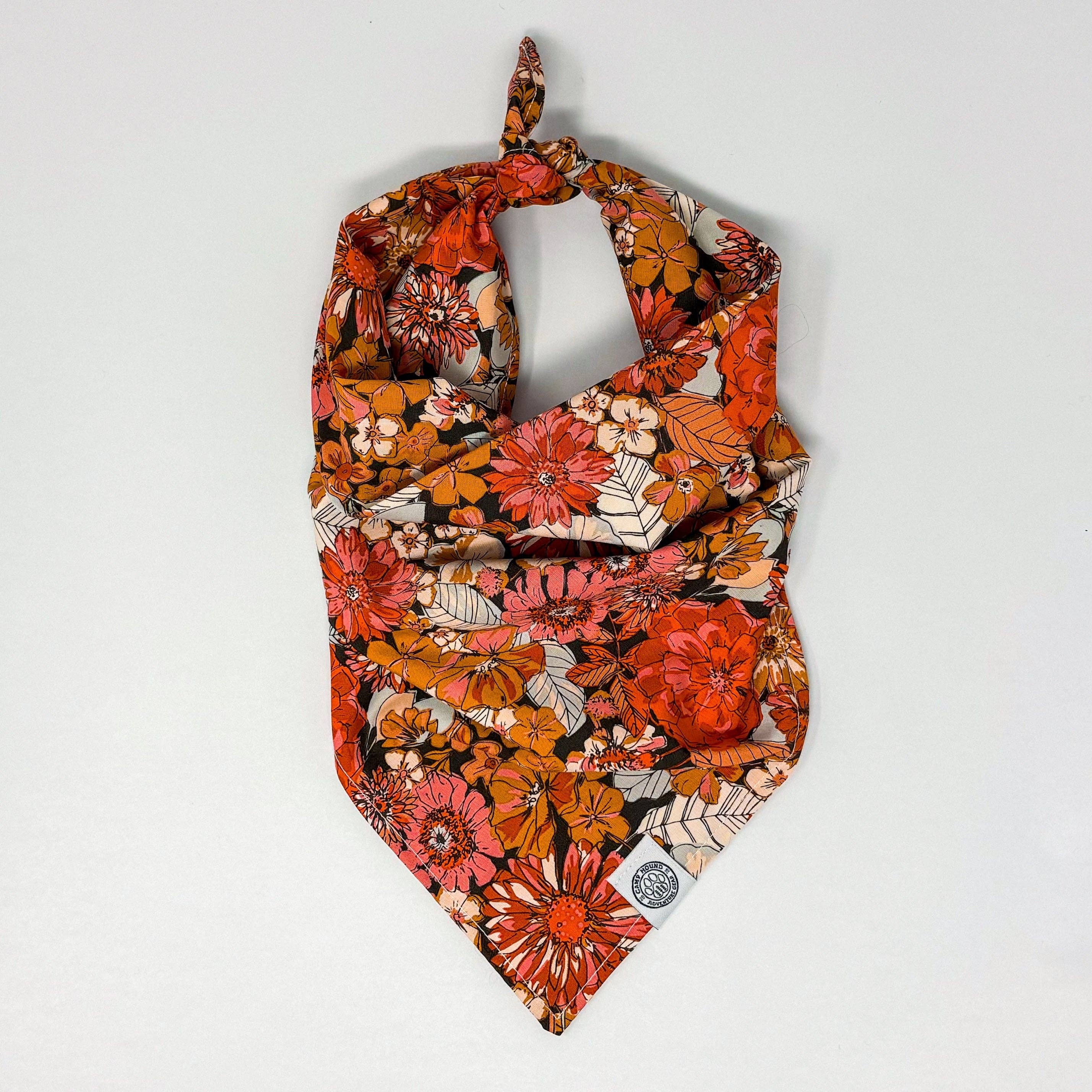 Named after our pup-in-charge, let your pup be the envy of the park in our Sophie Bandana! Unapologetically floral and maximalist, this piece is perfect for your outdoorsy pooch. Get ready to watch 'em bloom!

All of our bandanas are tie-on. 
We recommend