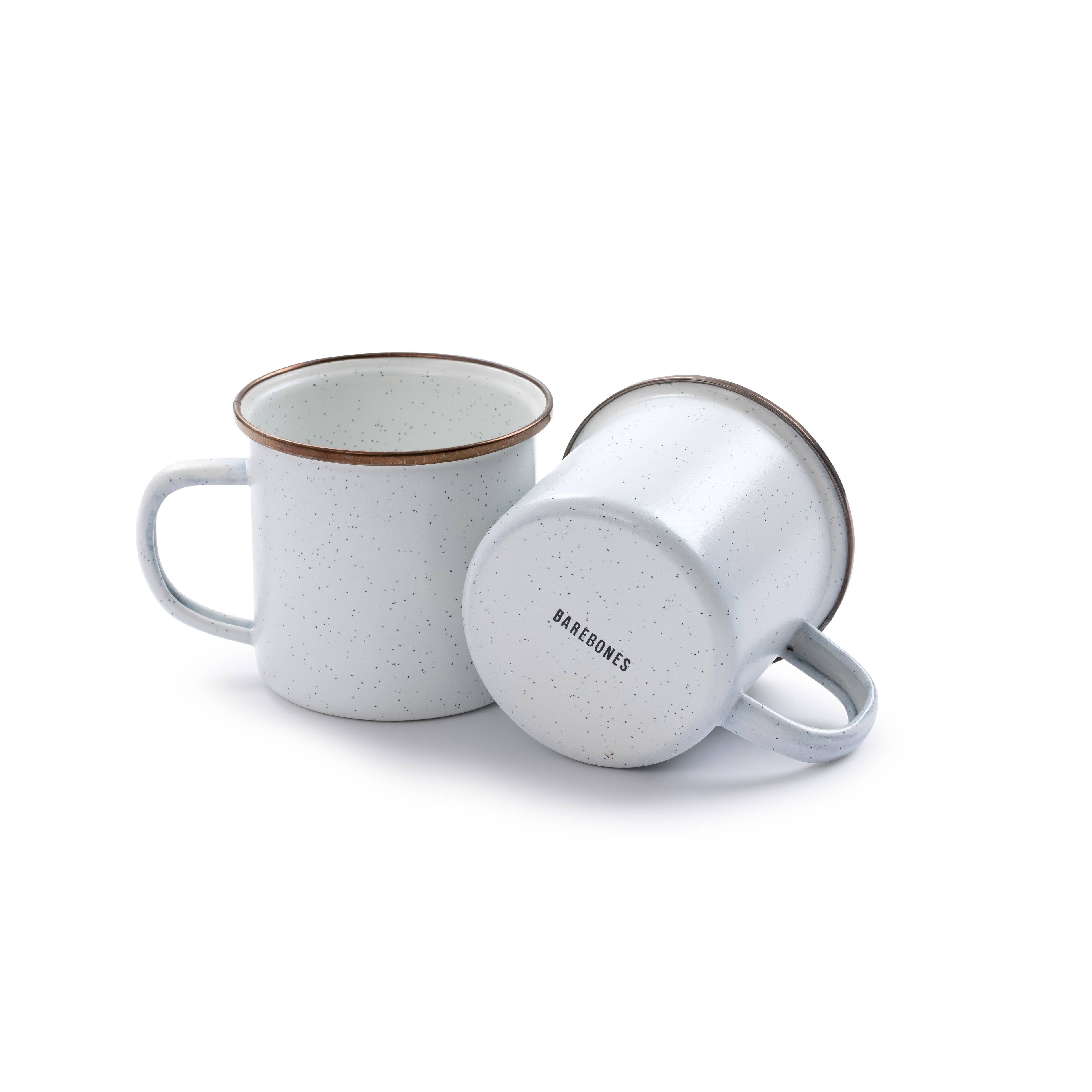 Complete your place settings with this set. Highlighted by a copper rim, a cup of coffee never looked so inviting. Each item features a hand-finished baked stainless steel trim, creating unique pieces that form a cohesive set.

Our Enamelware rim is heat 